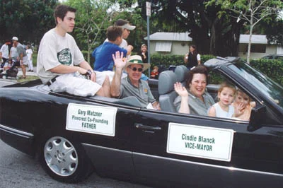 Gary Matzner in a Pinecrest parade car.